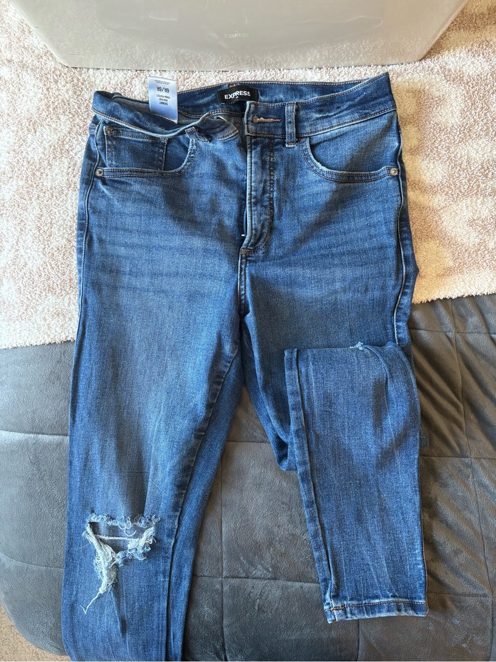 Express Skinny Jeans in Dark Blue Denim with Knee Distress